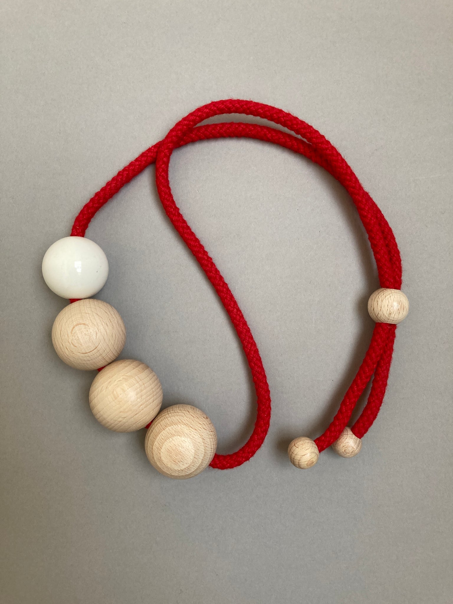 Sample necklace on red cord