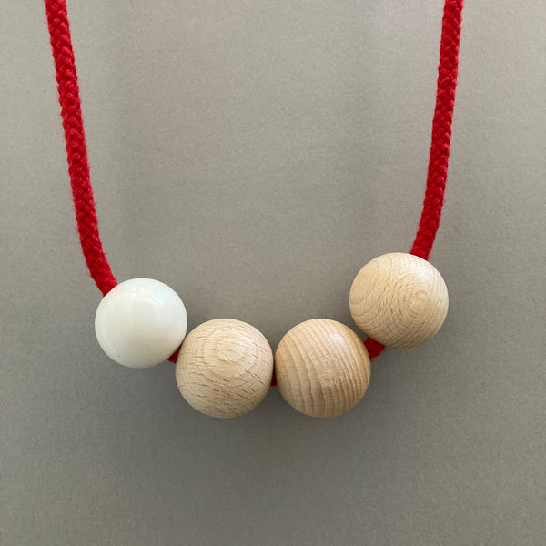 Sample necklace on red cord