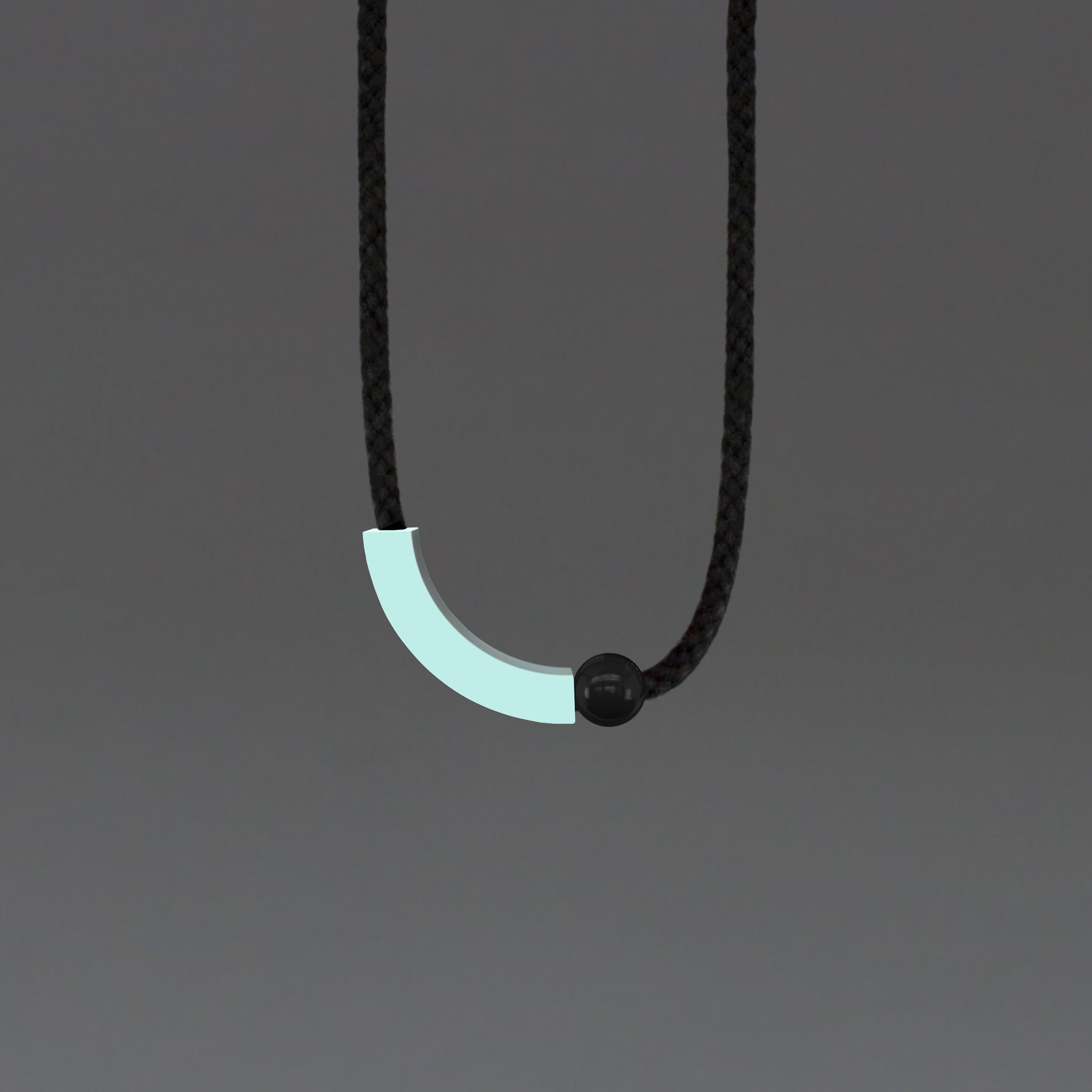 The Arp necklace is minimalist and striking. The mint resin curve sits off-centre beside a small black resin ball, offering a simple, but interesting design. The necklace is quite light, so very wearable. A contemporary design. Comes boxed in our branded kraft tube.