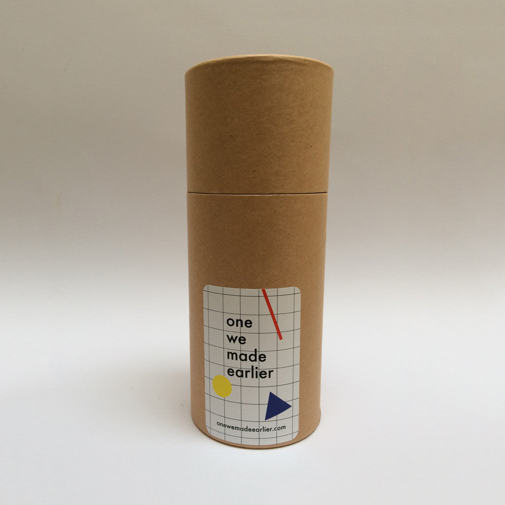 Tube packaging for accessories by One We Made Earlier.